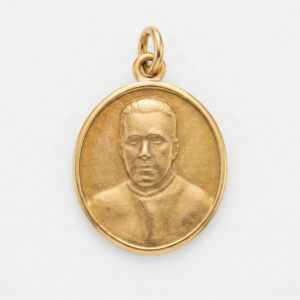 Medalla religiosa en oro con relieve retrato santo